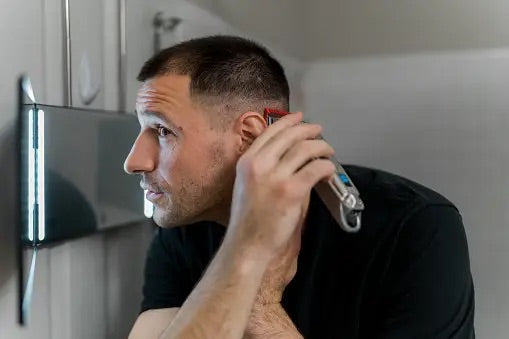 A man using a clipper.