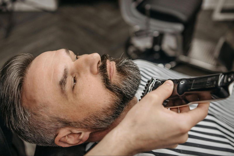 Man Getting Beard Trimmed