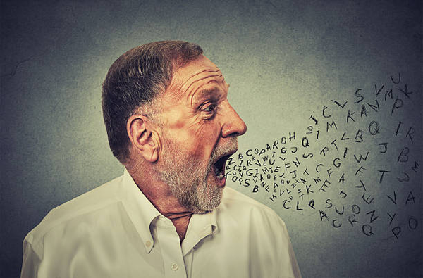 Man with Letters Coming out of Mouth