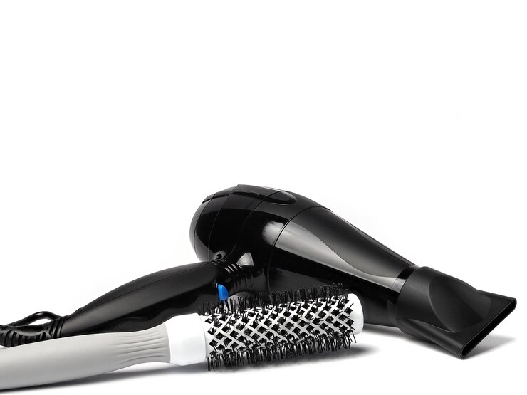 Hair dryer and a brush