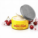 Yellow pomade jar with lid open, showing creamy product inside.