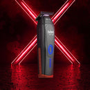 Black cordless hair trimmer with blue lights, held at slight angle, gold blade
