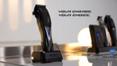 Wahl cordless clipper charging on base, black body with blue status lights