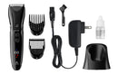 Beard & body grooming trimmer kit with guard combs, charger, and cleaning bottle