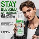 Aftershave bottle with white cap and green label, held in front of a man