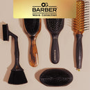 Black wave brush with oval head and bristle pins, shown with another brush