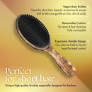 Hair wave brush with black boar-style bristles and ergonomic wooden handle
