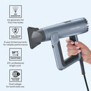 Gray handheld hair dryer with nozzle attachment and power control area