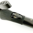 Gold-barrel curling iron with black handle and temperature dial window on the grip
