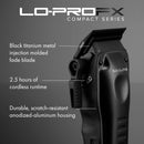 Black compact clipper with curved body, side lever, and visible blade housing