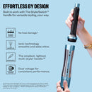 Teal-and-black curling attachment with barrel, shown in hand for styling