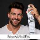 Smiling man holding L3VEL3 Freeze Hair Spray aerosol can with black cap