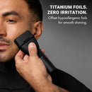 BaBylissPRO matte black cordless foil shaver held against the cheek for grooming