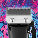 Hair clipper blade close-up with metal teeth and attachment comb guard