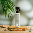 Sea salt spray bottle with black trigger, showing the back label and barcode.