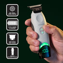White wireless charging trimmer held in hand with green LED battery screen
