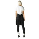 Black stylist apron back view with tied waist and wide coverage