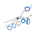 Stainless texturizing shears with blue finger loops and comb-like shark-fin teeth