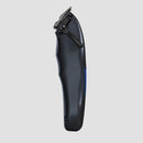 Wahl cordless clipper side view, black lever near blade with blue accent light