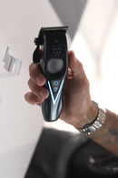 Wahl cordless hair clipper with black body and blue light switch on handle