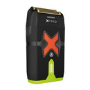 Cordless clipper with orange X accent and gold foil blade, front view