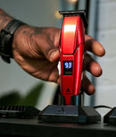 Andis cordless hair trimmer, red and black with LED display and charging base