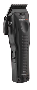 Low profile hair clipper with metal blade, dark body and side adjustment switch