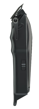 Low profile hair clipper side profile, dark body with adjustment switch and blade guard