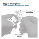 Professional grade clipper moving blade on clipper assembly, held by gloved hands