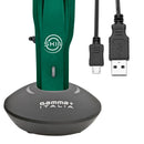 Cordless skin clipper on charging dock with USB cable and plug